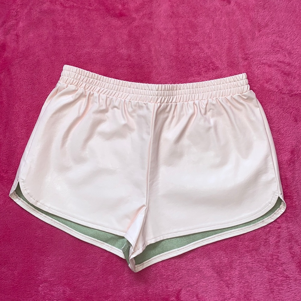 Baby pink faux leather shorts